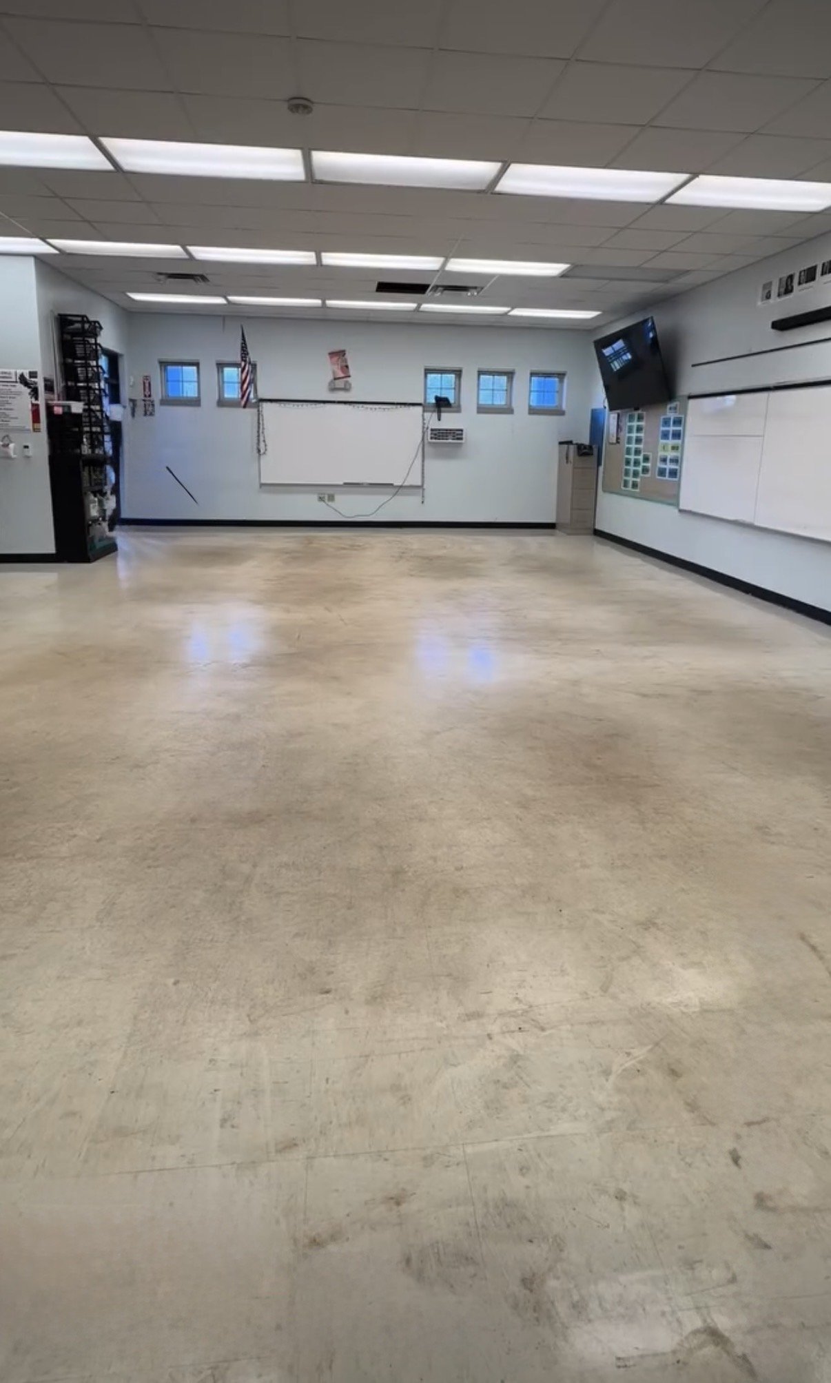 Dull, worn multipurpose room floor before strip and wax
