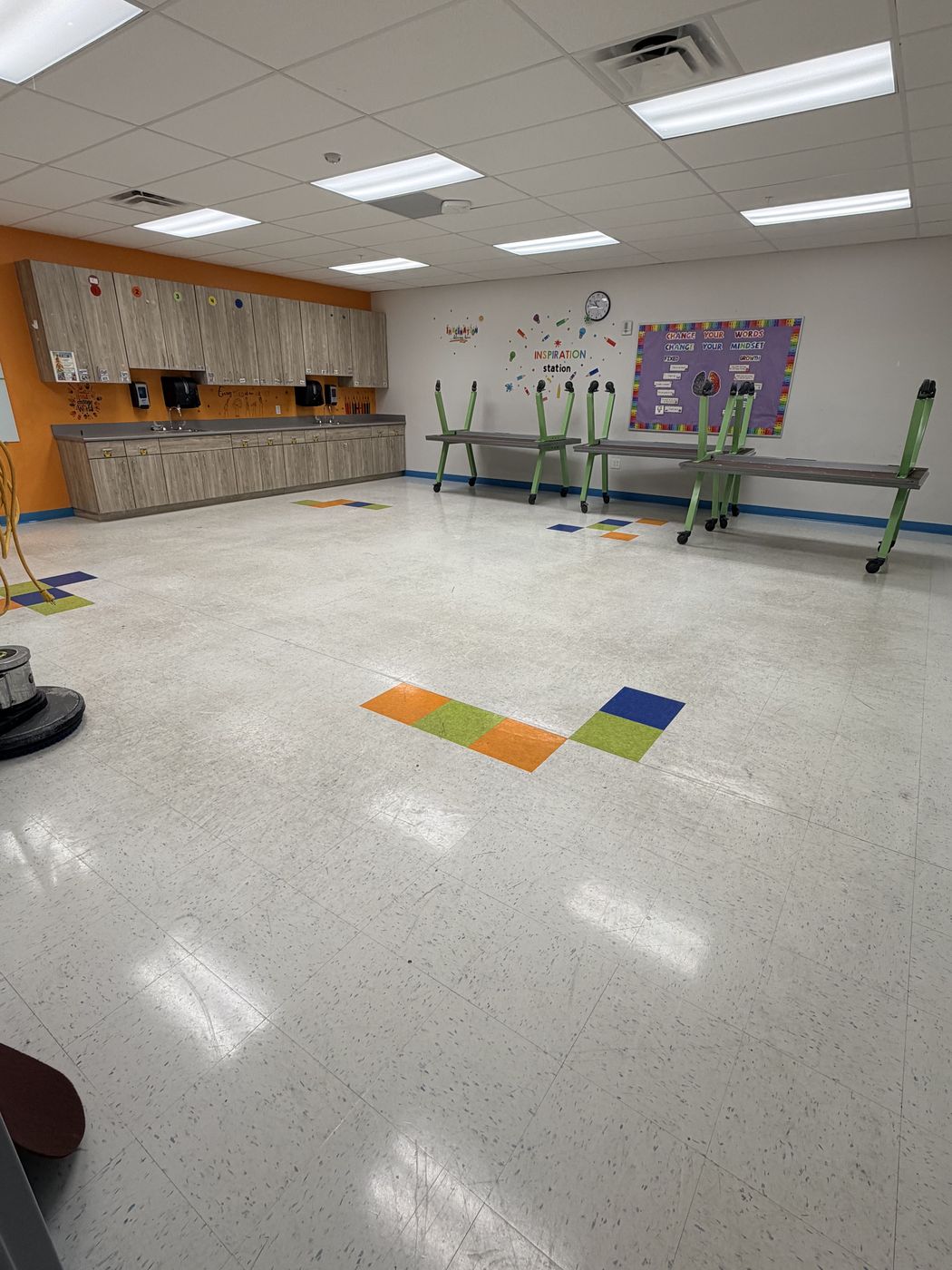 Classroom vinyl floor before strip and wax